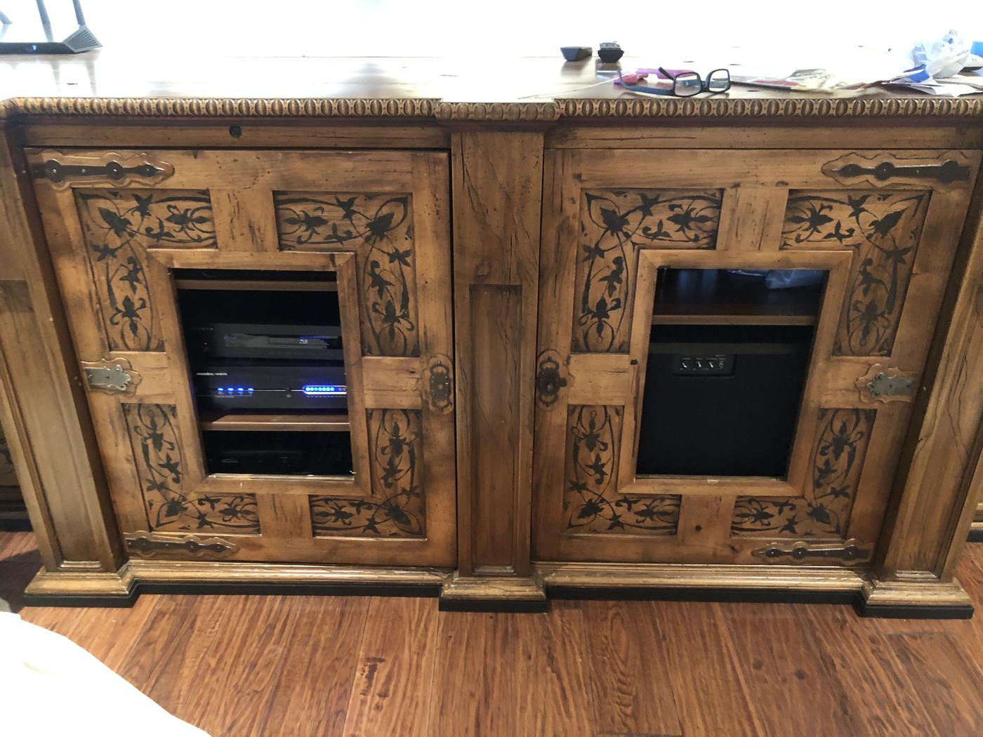 Hand-carved media cabinet with custom stain and finish